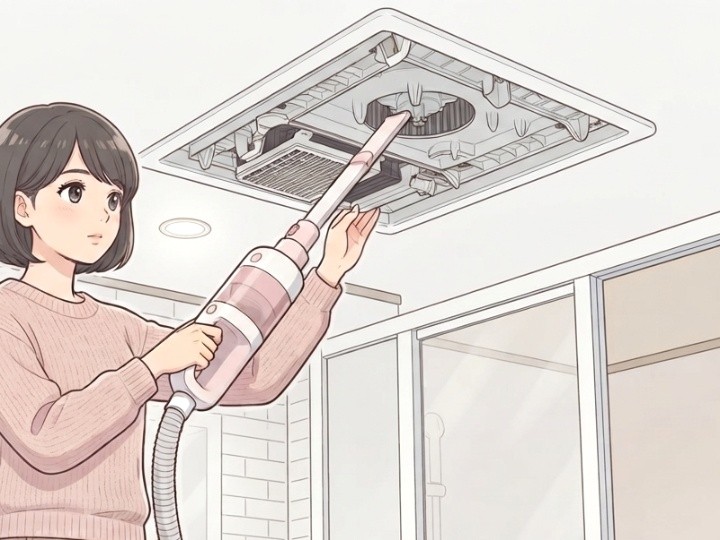 掃除機でフィルターのホコリを取り除く